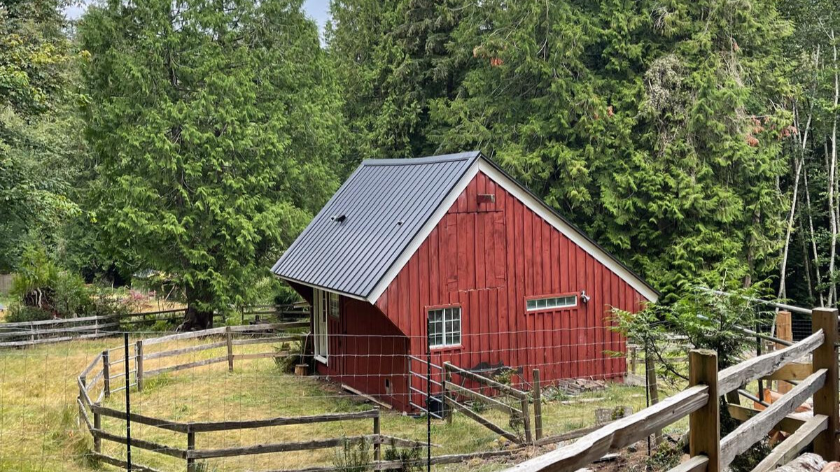 Red barn with metal roof