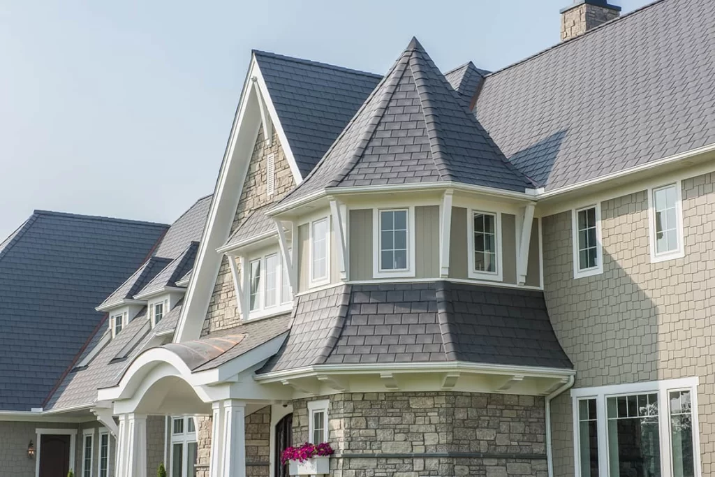 Victorian style home with turret, featuring enviroslate roofing