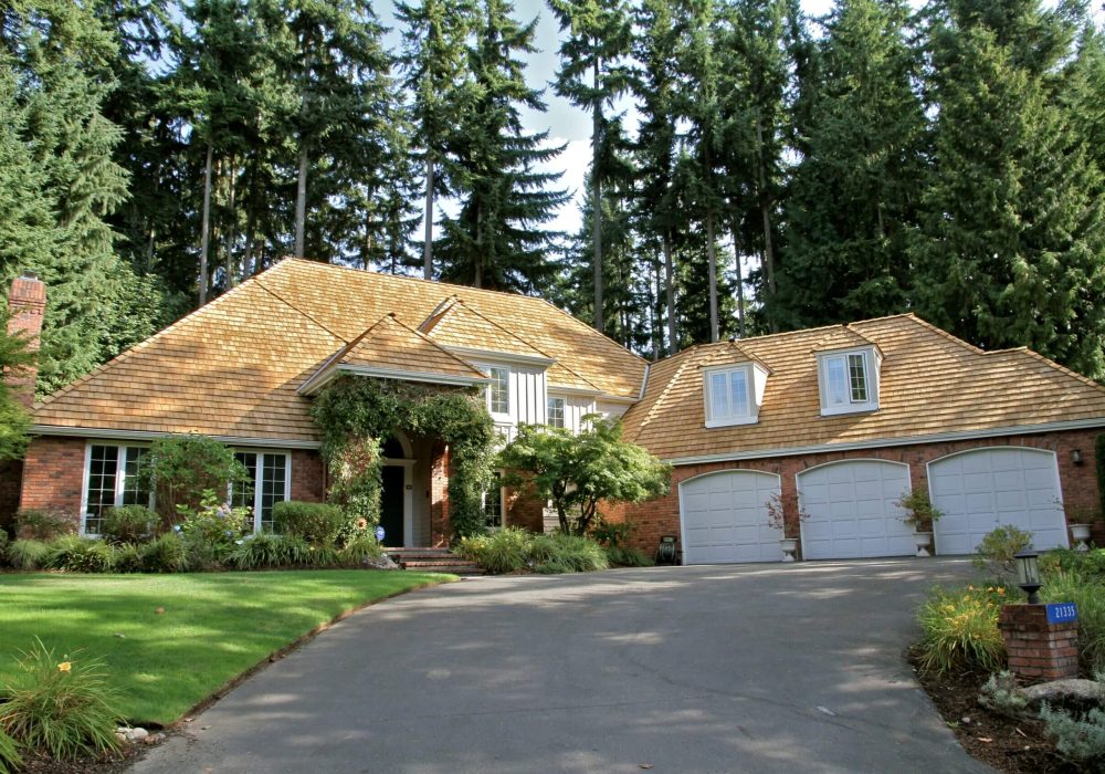 West coast home covered with cedar shingle roofing